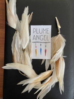 This is Long Magical Cream Feather Hair Clip – Enchanting Elegance for Your Hair