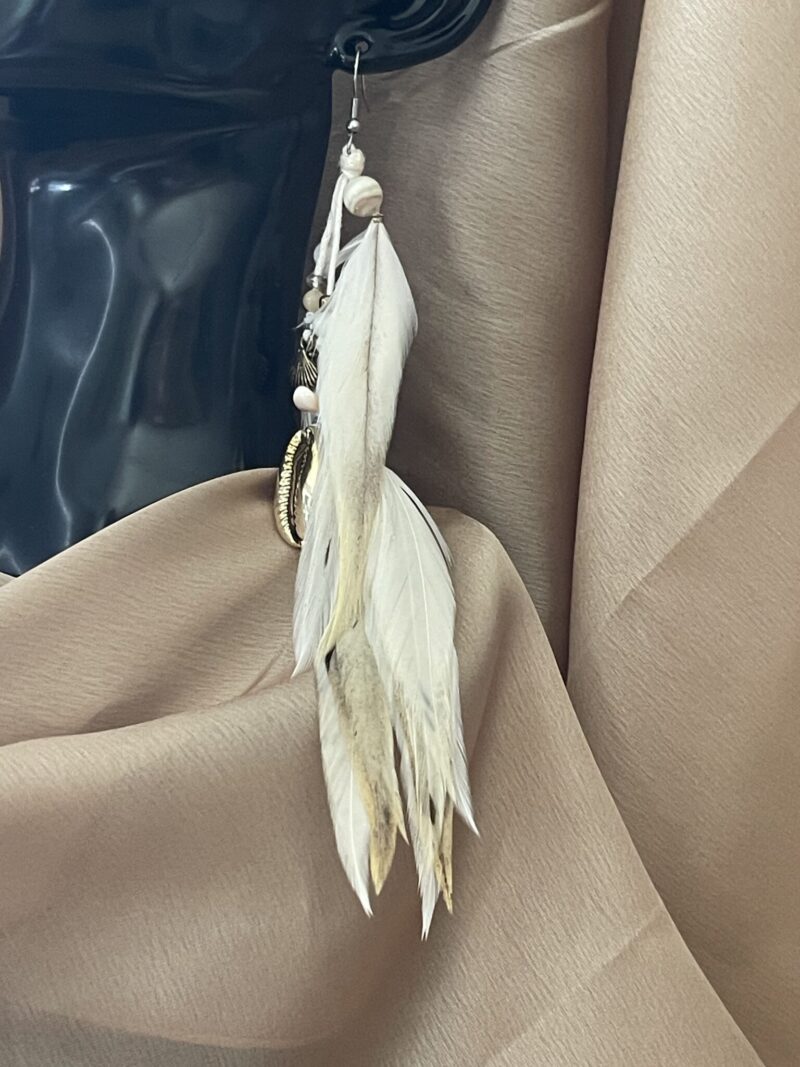 These are White Grey Gold Feather Earrings – Coastal Elegance with a Touch of Luxury