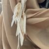 This is Long Magical Cream Feather Hair Clip – Enchanting Elegance for Your Hair