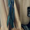 This is Turquoise Blue Brown Medium Feather Clip – Effortless Boho Elegance