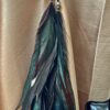 This is Dark Chocolate Forest Green Feather Clip – Natural Elegance with a Rustic Charm