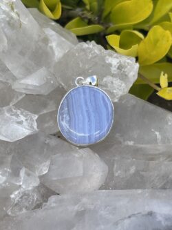 This is Timeless Elegance: Round Blue Lace Agate Pendant in Silver