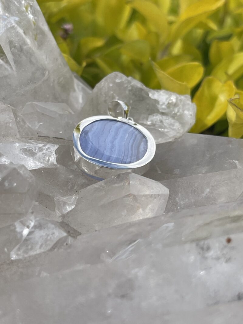 This is Timeless Elegance: Round Blue Lace Agate Pendant in Silver