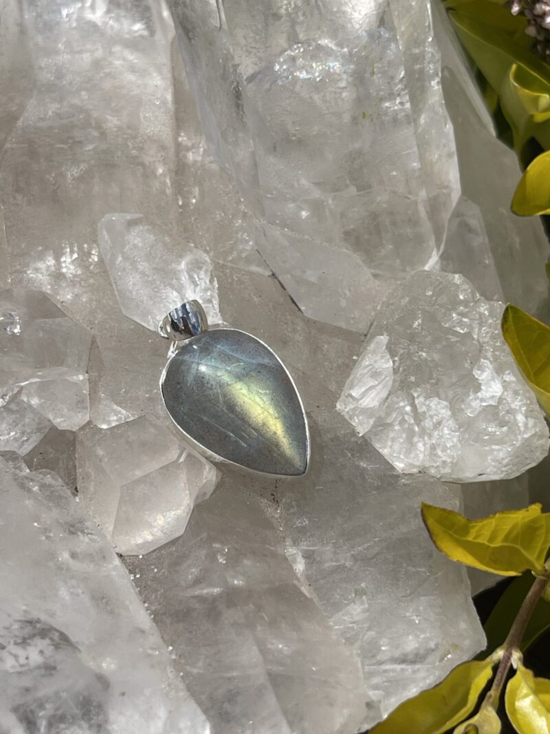 This is Mystical Charm: Small Labradorite Teardrop Pendant in Silver