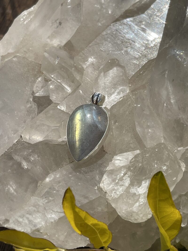 This is Mystical Charm: Small Labradorite Teardrop Pendant in Silver