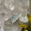 This is Mystical Charm: Small Labradorite Teardrop Pendant in Silver