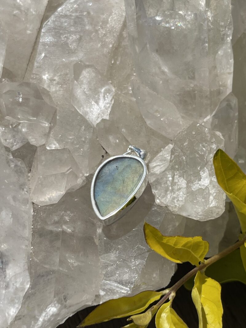 This is Mystical Charm: Small Labradorite Teardrop Pendant in Silver