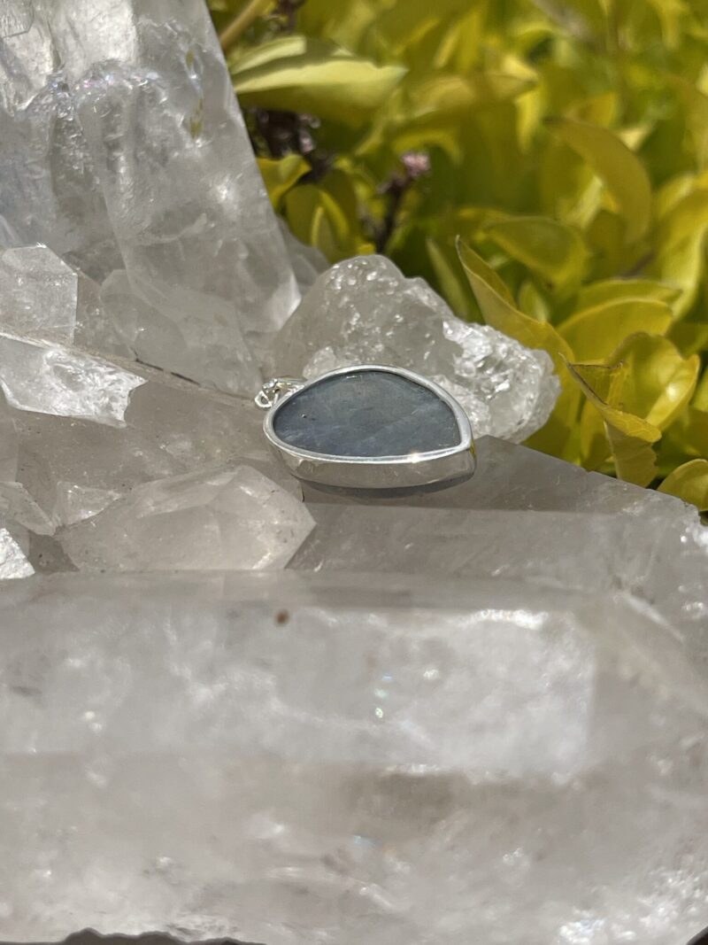 This is Mystical Charm: Small Labradorite Teardrop Pendant in Silver