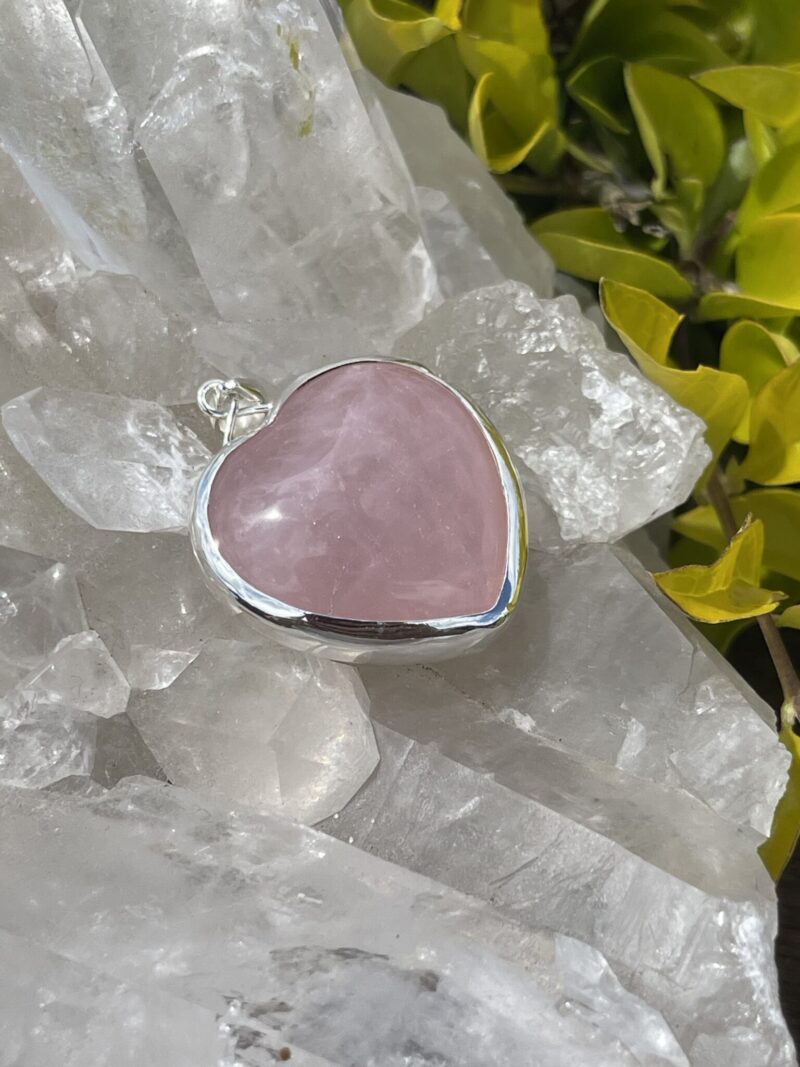 This is A Loving Embrace: Heart-Shaped Deep Rose Quartz Pendant in Silver