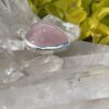 his is A Loving Embrace: Heart-Shaped Deep Rose Quartz Pendant in Silver