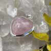 his is A Loving Embrace: Heart-Shaped Deep Rose Quartz Pendant in Silver