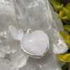 This is A Loving Embrace: Heart-Shaped Gentle Rose Quartz Pendant in Silver