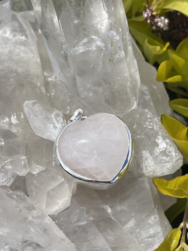 This is A Loving Embrace: Heart-Shaped Gentle Rose Quartz Pendant in Silver