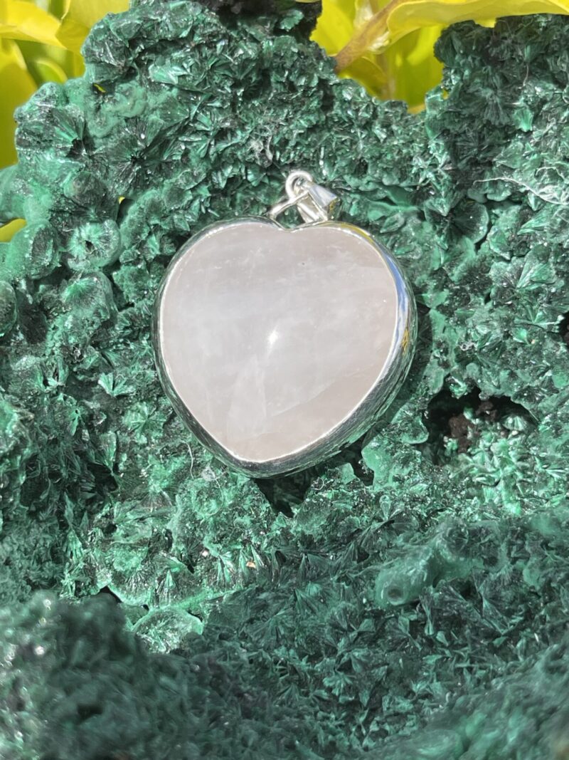 This is A Loving Embrace: Heart-Shaped Gentle Rose Quartz Pendant in Silver