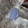 This is Timeless Elegance: Round Blue Lace Agate Pendant in Silver