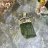 This is Verdant Moldavite Pendant in Silver M514 Verdant Light: Moldavite Pendant in Silver