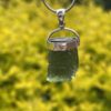 This is Verdant Moldavite Pendant in Silver M514 Verdant Light: Moldavite Pendant in Silver