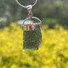 This is Verdant Moldavite Pendant in Silver M514 Verdant Light: Moldavite Pendant in Silver