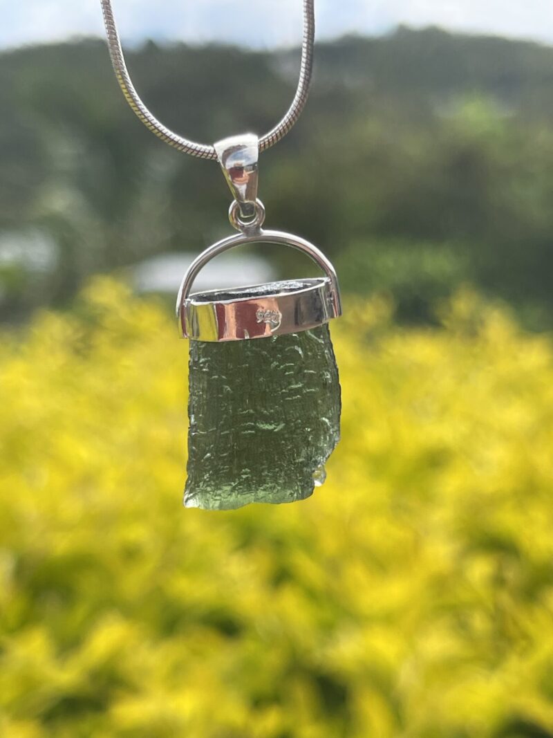 This is Verdant Moldavite Pendant in Silver M514 Verdant Light: Moldavite Pendant in Silver