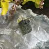 This is Radiant Moldavite Pendant in Silver M515 Radiant Transformation: Moldavite Pendant in Silver