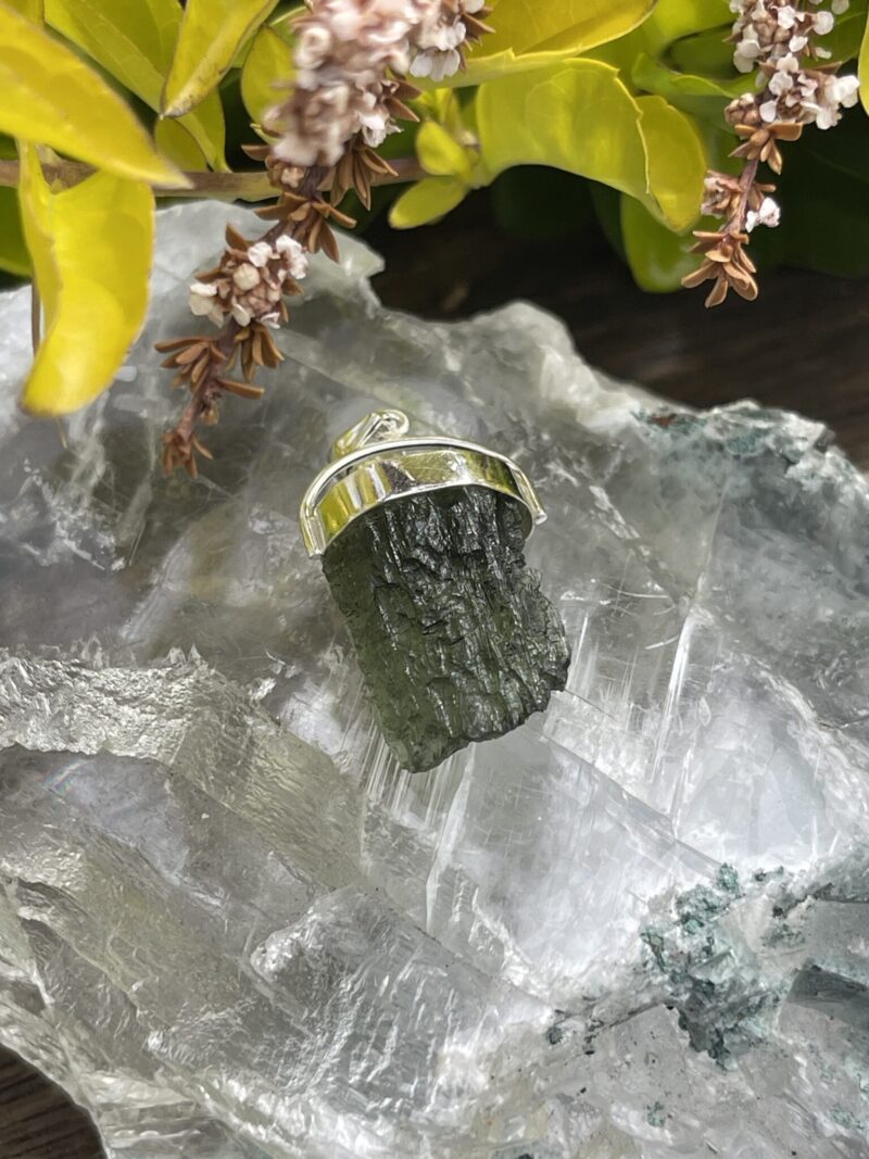 This is Radiant Moldavite Pendant in Silver M515 Radiant Transformation: Moldavite Pendant in Silver