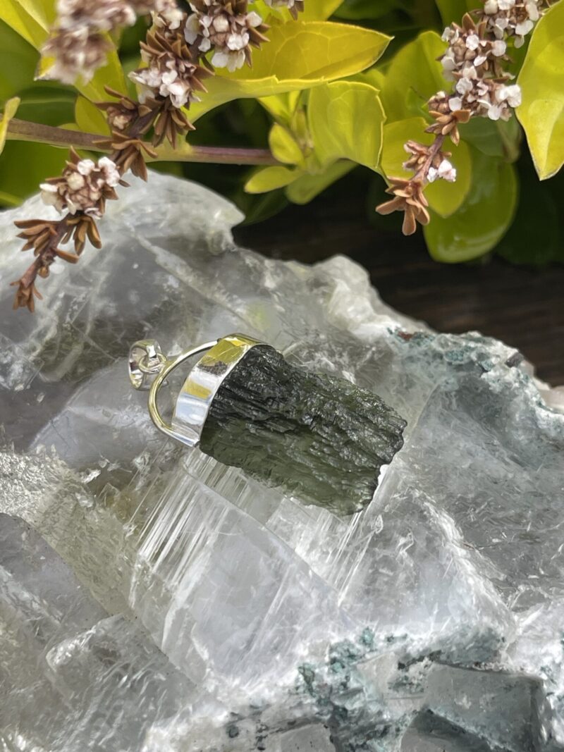 This is Radiant Moldavite Pendant in Silver M515 Radiant Transformation: Moldavite Pendant in Silver