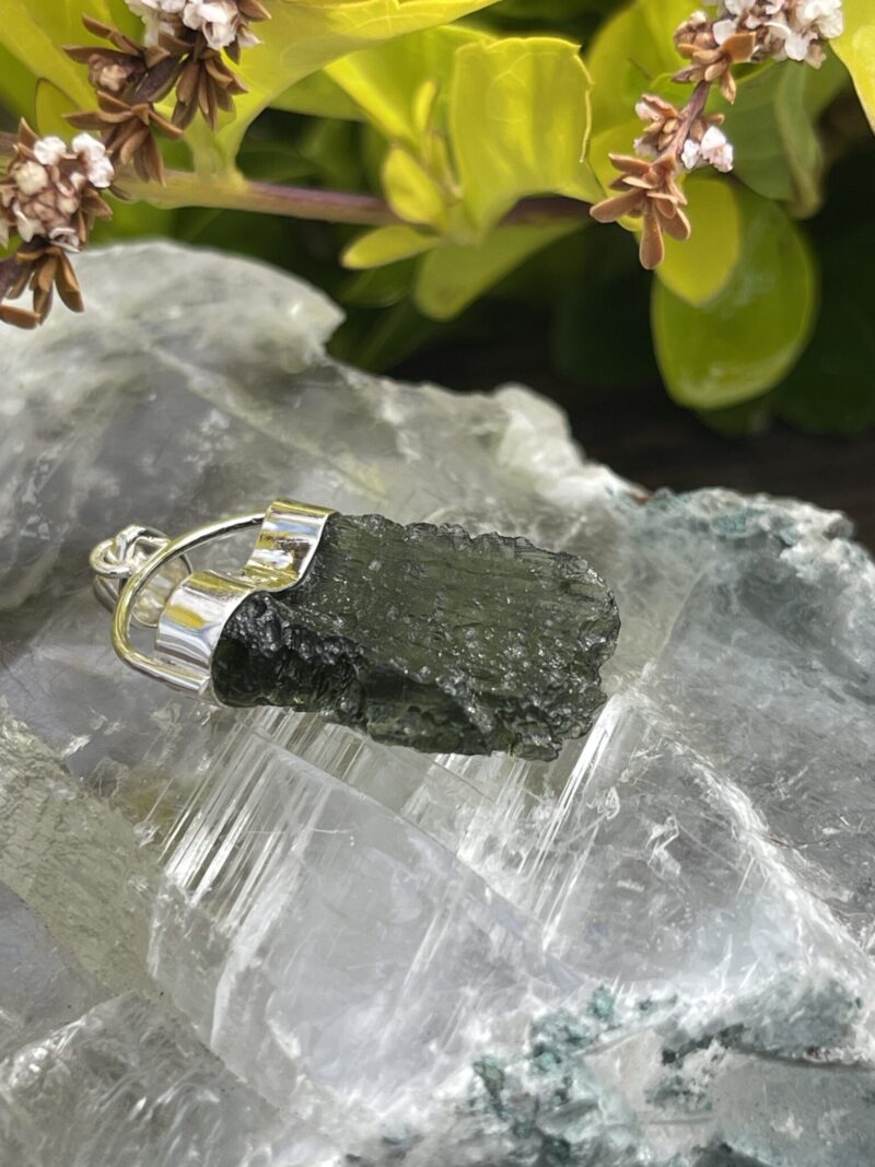 This is Radiant Moldavite Pendant in Silver M515 Radiant Transformation: Moldavite Pendant in Silver