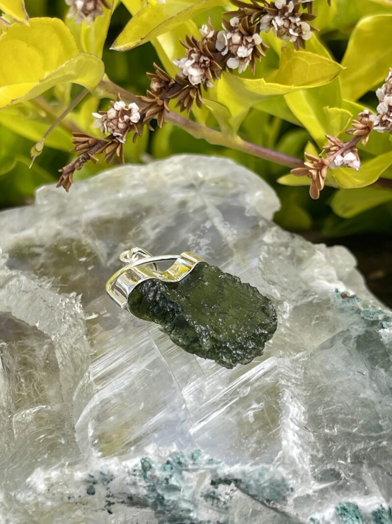 This is Radiant Moldavite Pendant in Silver M515 Radiant Transformation: Moldavite Pendant in Silver