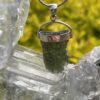 This is Radiant Moldavite Pendant in Silver M515 Radiant Transformation: Moldavite Pendant in Silver