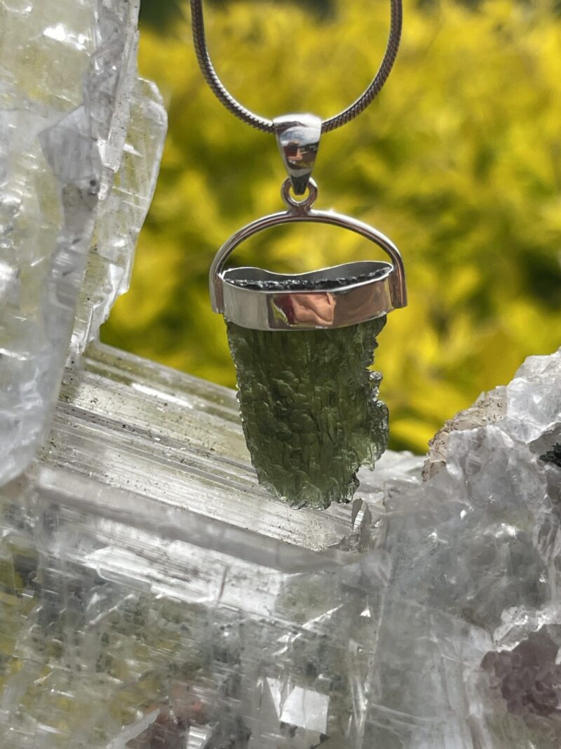 This is Radiant Moldavite Pendant in Silver M515 Radiant Transformation: Moldavite Pendant in Silver