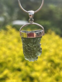 This is Radiant Moldavite Pendant in Silver M515 Radiant Transformation: Moldavite Pendant in Silver