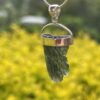 This is Radiant Moldavite Pendant in Silver M515 Radiant Transformation: Moldavite Pendant in Silver