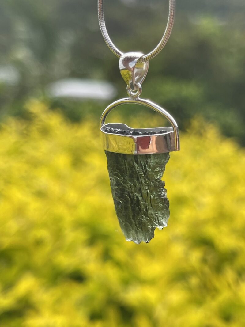 This is Radiant Moldavite Pendant in Silver M515 Radiant Transformation: Moldavite Pendant in Silver