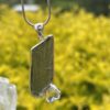 This is Moldavite Herkimer Diamond Pendant in Silver MH519 Stellar Brilliance: Moldavite and Herkimer Diamond Pendant in Silver