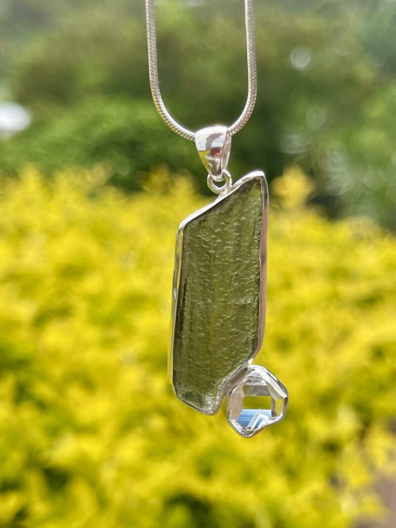 This is Moldavite Herkimer Diamond Pendant in Silver MH519 Stellar Brilliance: Moldavite and Herkimer Diamond Pendant in Silver