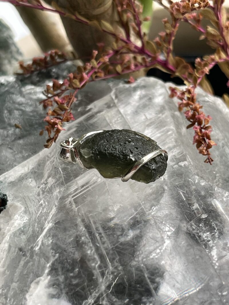 This is Galactic Glow Moldavite Pendant in Silver M547