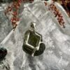 This is Galactic Glow Moldavite Pendant in Silver M547