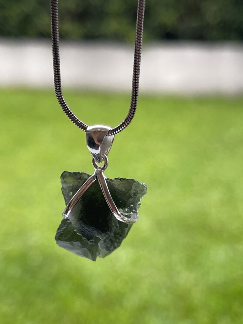 This is Luminous Verdant Moldavite Pendant in Silver M543