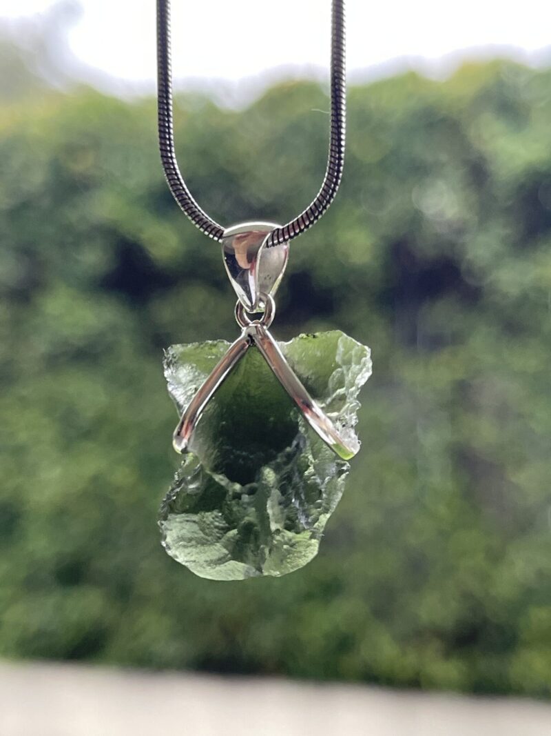 This is Luminous Verdant Moldavite Pendant in Silver M543