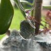 This is Galactic Glow Moldavite Pendant in Silver M547