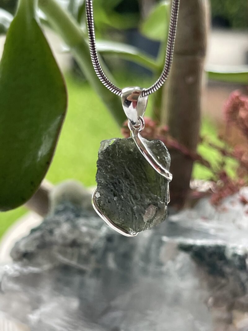 This is Galactic Glow Moldavite Pendant in Silver M547