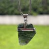 This is Ethereal Glow: Moldavite Pendant in Silver M553