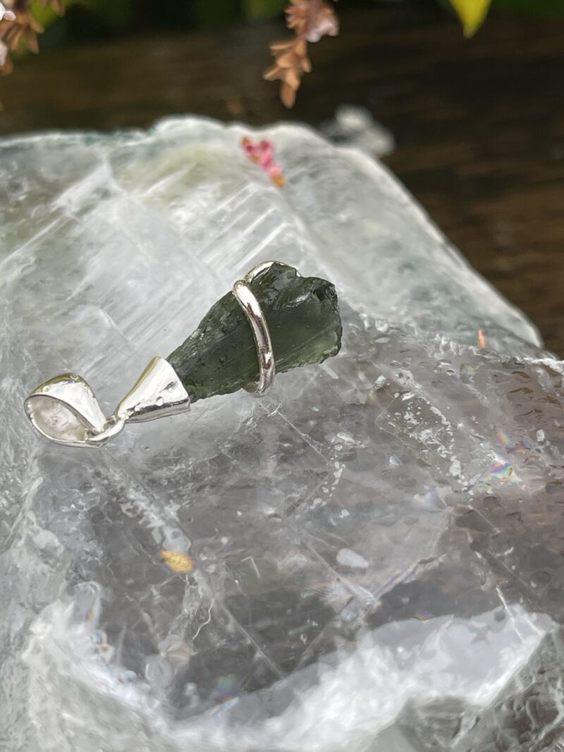 This is Transformational Glow: Moldavite Pendant in Silver M532