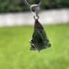 This is Transformational Glow: Moldavite Pendant in Silver M532