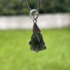 This is Transformational Glow: Moldavite Pendant in Silver M532