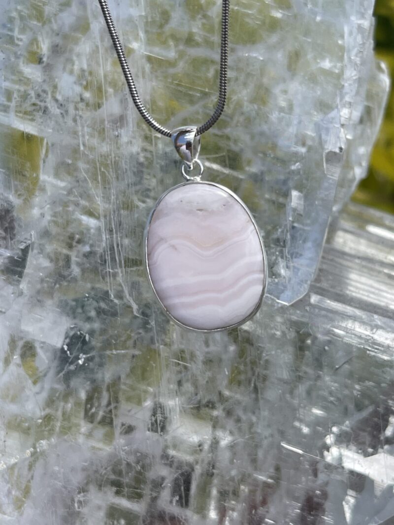 This is Round Mangano Calcite Pendant in Silver