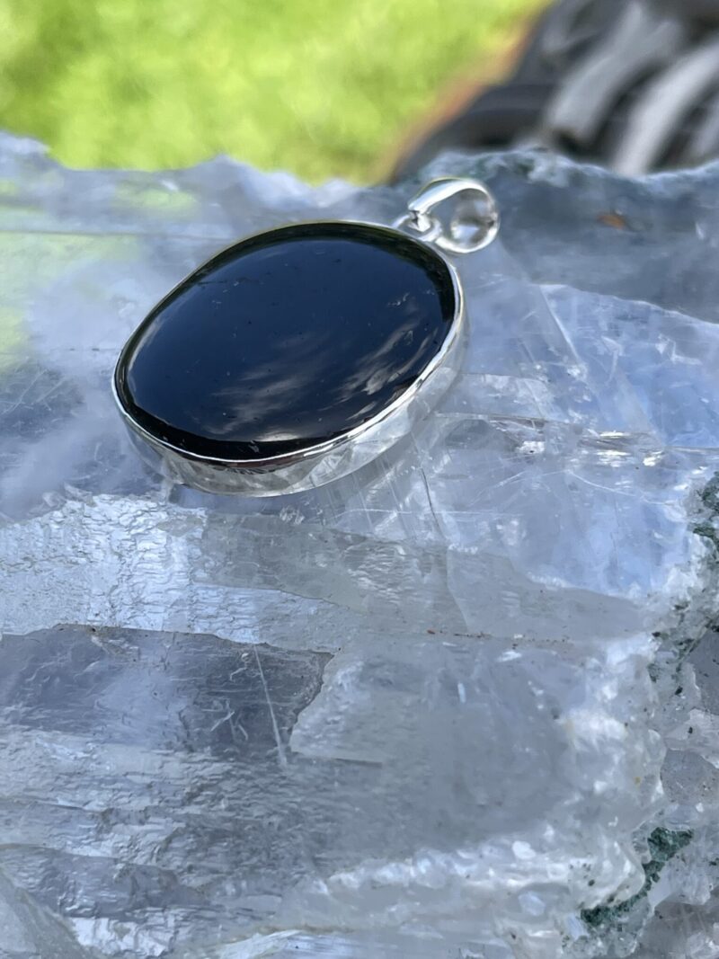 This is Round Black Tourmaline Pendant in Silver