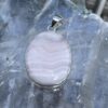 This is Round Mangano Calcite Pendant in Silver