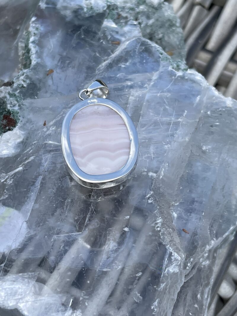 This is Round Mangano Calcite Pendant in Silver