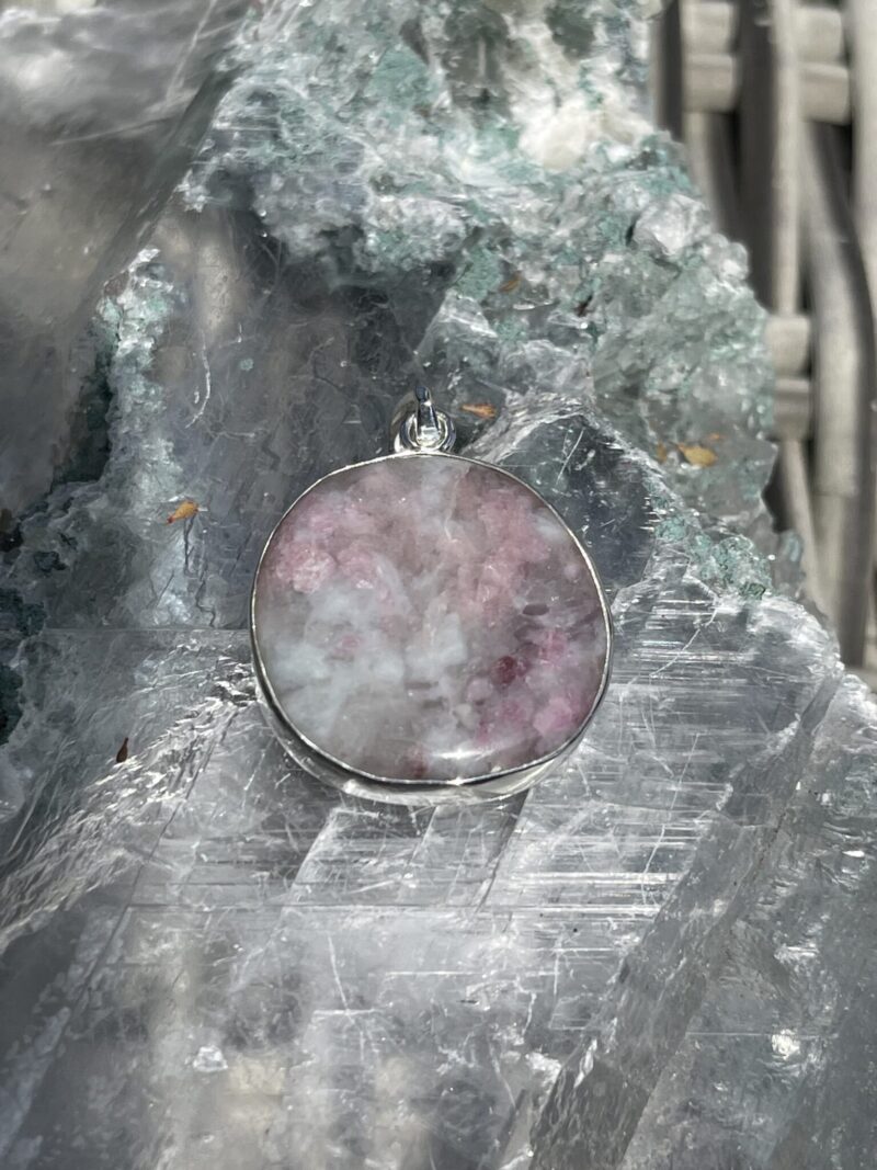 This is Round Pink Tourmaline in Quartz Pendant in Silver